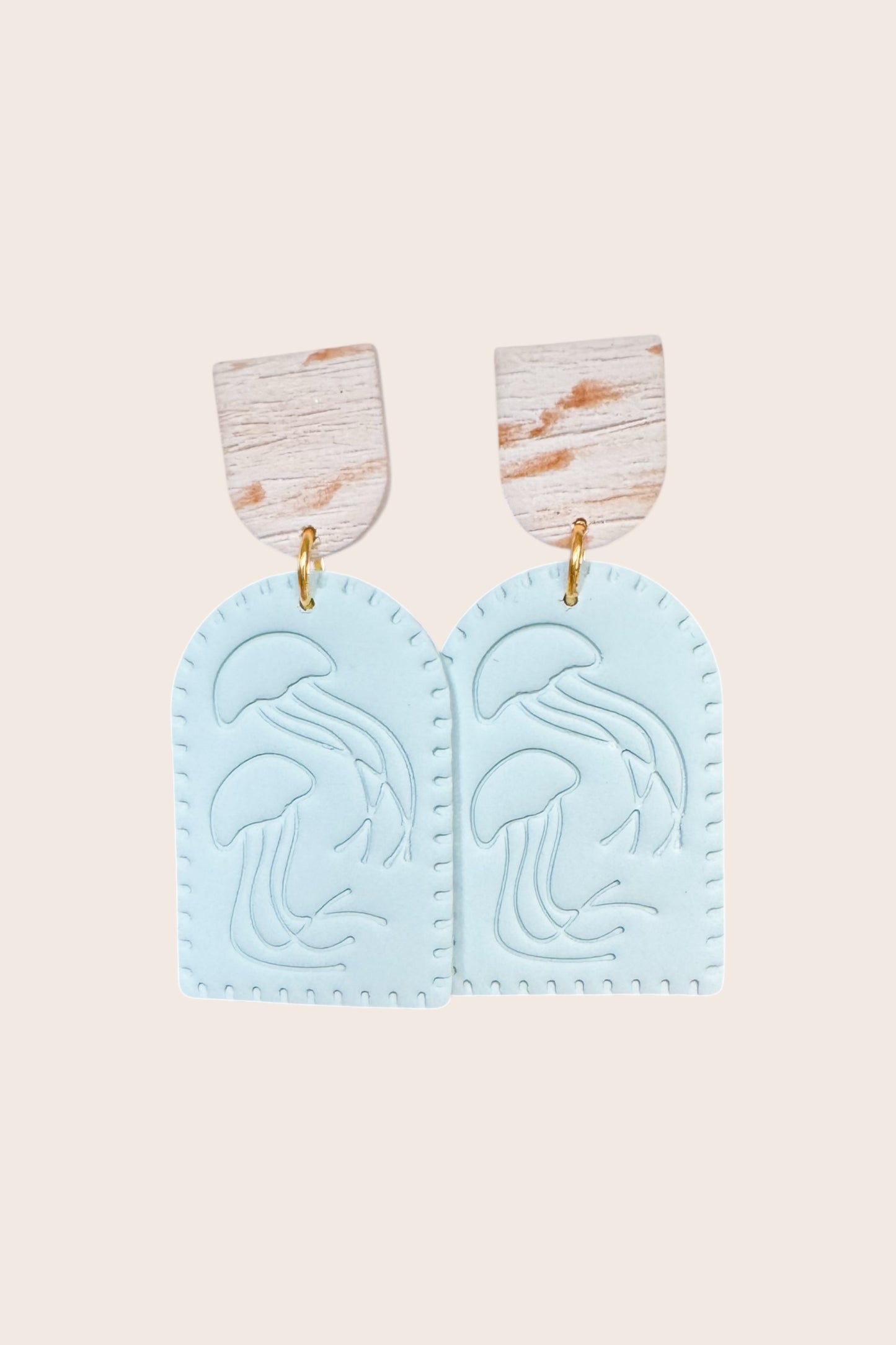 Tropical Dangles